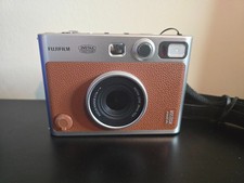Instax Mini Evo Hybridkamera - Braun / mit Trageriemen