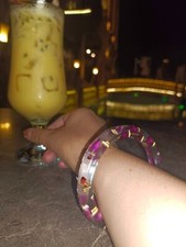 Bracelet with real purple flower