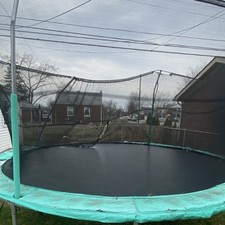 Outdoor Trampoline with Safety Net and Green Padding