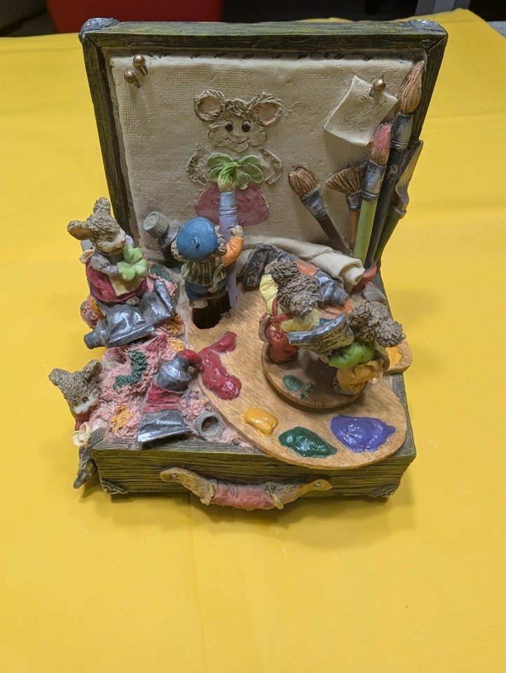 An Enesco multi-action music box with painting mice that animates while playing 'Toyland' — charming, whimsical, and very giftable vintage kitsch.