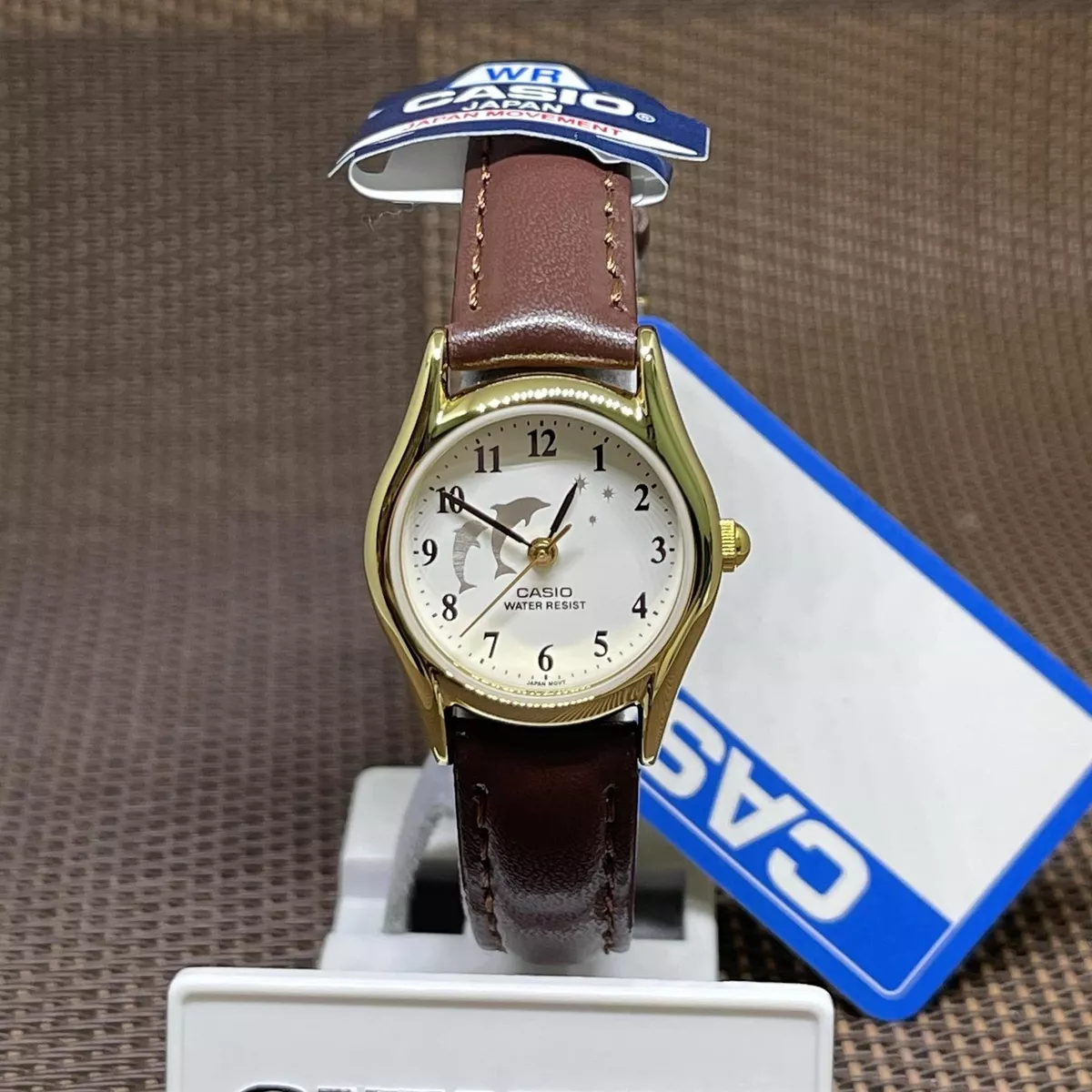 Casio LTP 1094Q 7B9 Dolphin White Analog Brown Leather Gold Ladies Casual Watch