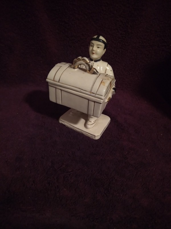 ASIAN MAN HOLDING CHEST CIGARETTE DISPENSER CERAMIC