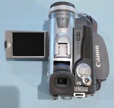 Canon Optura 30 Mini DV Camcorder Canon charger battery and remote excellent 