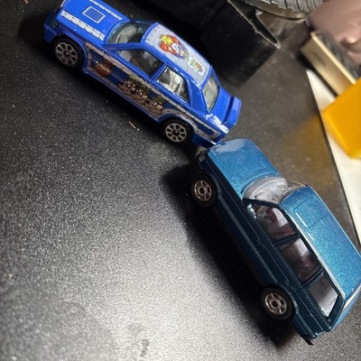 Lot Of 2 Burago Made In Italy 1/43 Cars.. Mercedes 190e Range Rover
