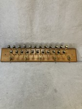 vintage golf-themed tie and belt holder