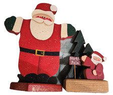 2 - vintage folk art painted wood cutout Santas