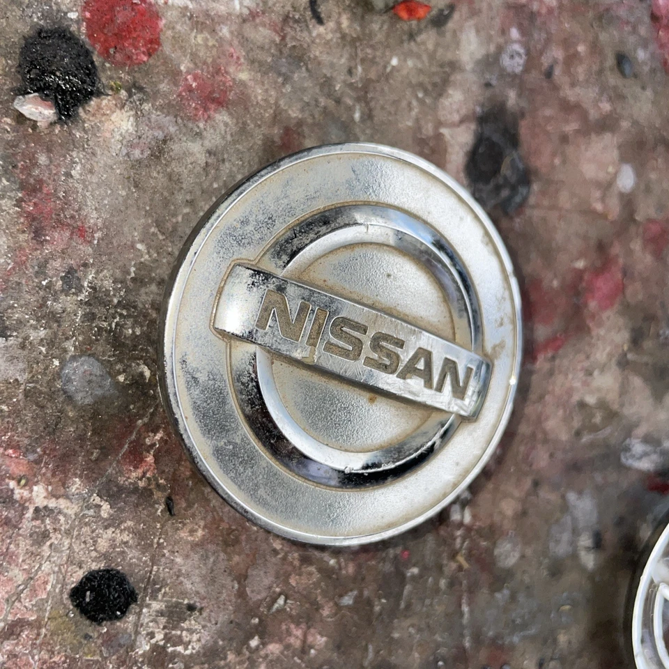 TAPA CENTRAL RUEDA NISSAN MURANO, QUEST, ROGUE, SENTRA, VERSA 40343-AU51A Foto 3 de 4