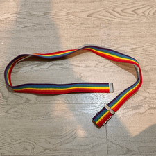 rainbow canvas web belt with a military-style metal buckle. 43 inches long  pe