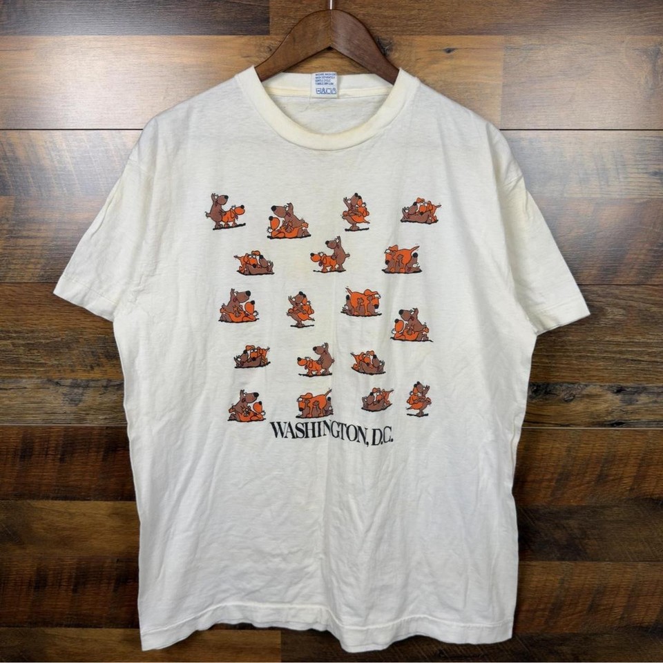 Single-stitch 90s Washington DC tee with a funny dog graphic — legitimately wearable vintage with the provenance to back it up.
