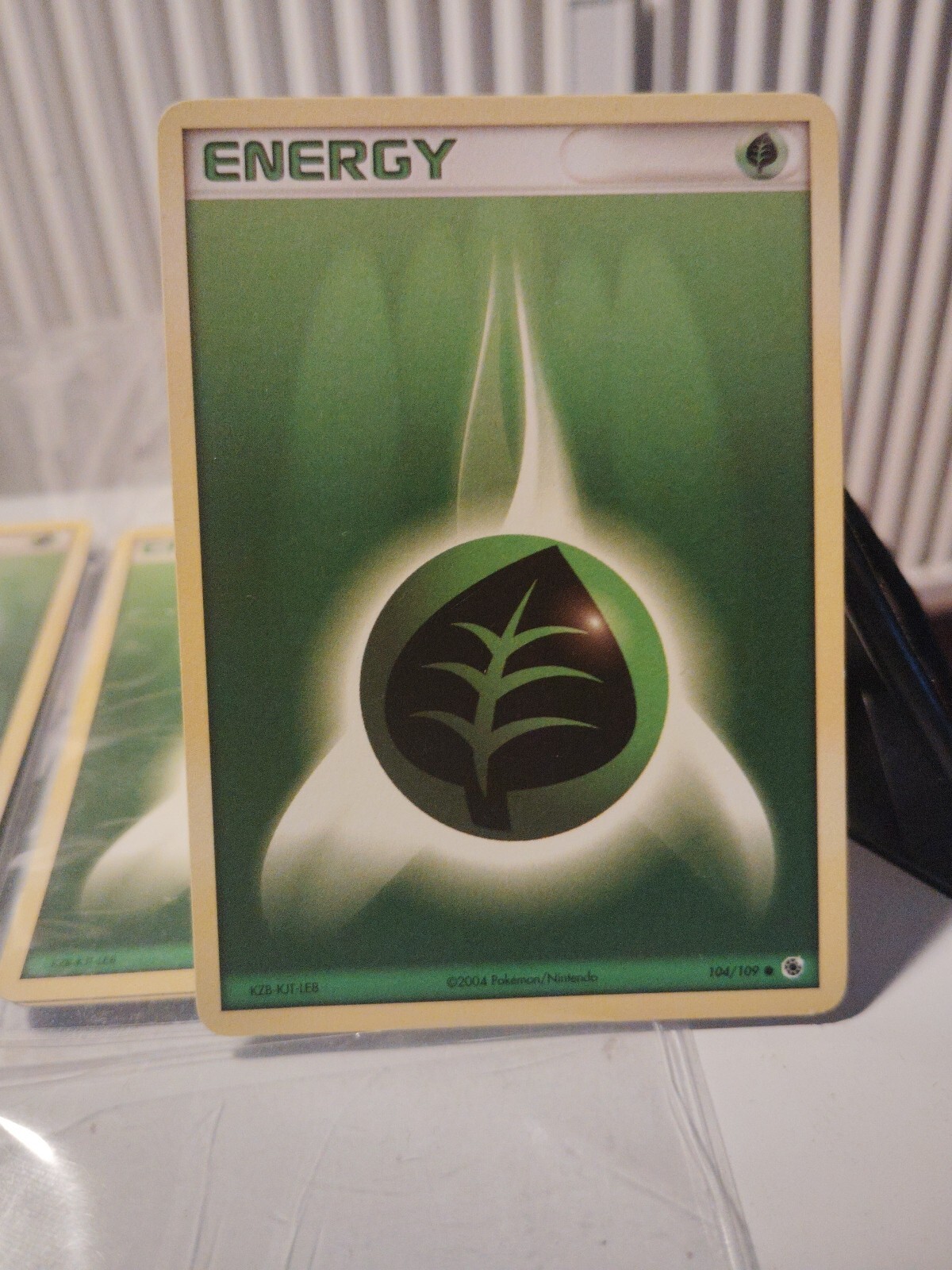 Grass Energy 104/109 Ruby and Sapphire Regular Mint Condition 2004 Pokemon