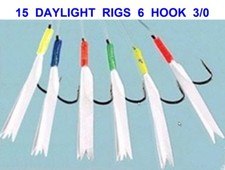 15 DAYLIGHT RIGS 6 HOOK 3/0 SEA FISHING BOAT ROD LURES MACKEREL COD FEATHERS