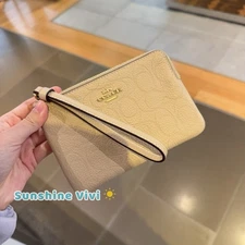 NWT Coach Corner Zip Wristlet In Signature Leather Oat CCJ73