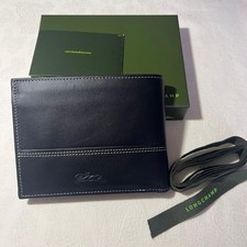 New, unused Longchamp bi-fold wallet