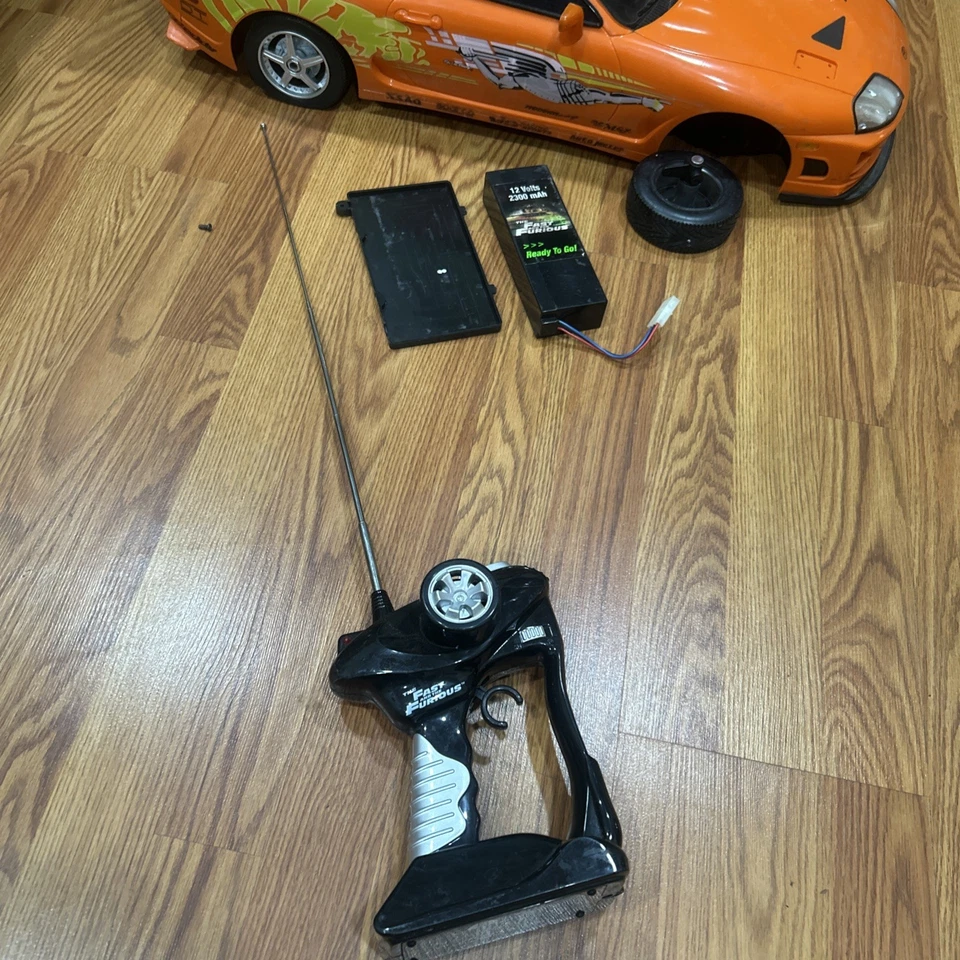 ORANGE 1995 TOYOTA SUPRA JADA TOYS RC CAR  REMOTE  SELLING AS PARTS & REPAIRS  - Image 2 of 4