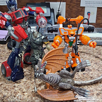 Hasbro Transformers Optimus Prime Mixed Lot Of 4 Garruk, Crazy Bones Dragon
