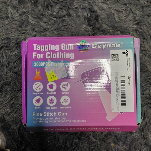 Tagging Gun For Attaching Labels To Clothing. About 2500 Fasteners Included. 