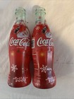 Two Coca-Cola Holiday Glass Bottles — photo 2