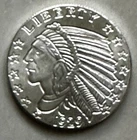 Silver 1/4 oz Incuse Indian Round. May Have Toning.