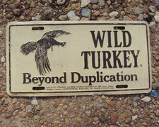 Vintage WILD TURKEY BOURBON Booster License Plate  Beyond Duplication Distressed