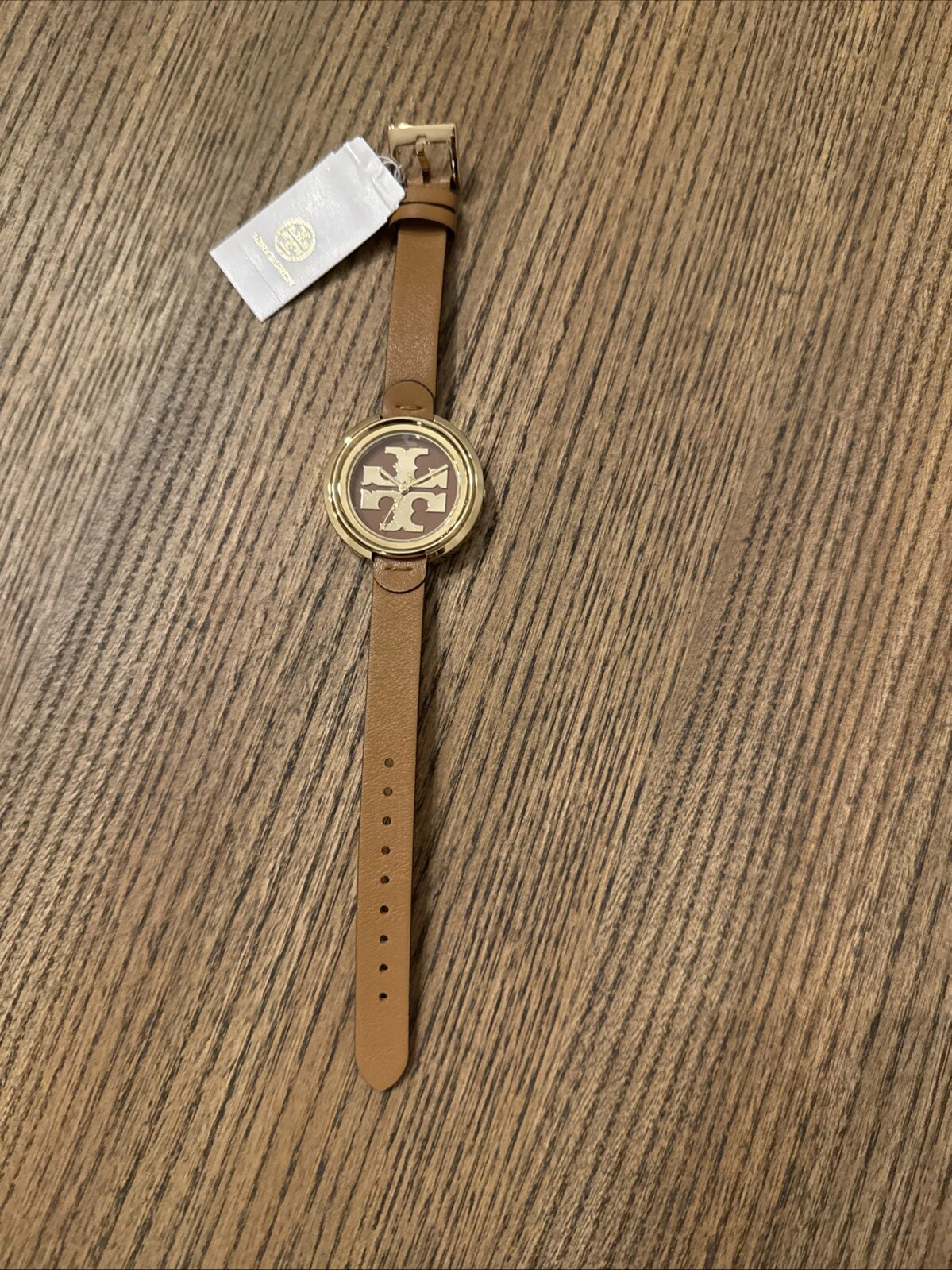 Orologio da donna Tory Burch oro e marrone bagagli pelle mugnaio TBW6201