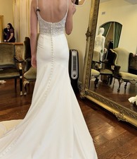 White Wedding Gown. Size 8-10. New with Tags. Never Used.