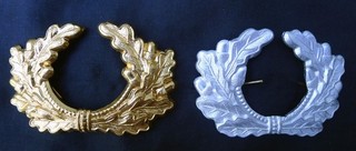 2 OLD WW2 GERMAN ARMY OFFICERS & ENLISTED MENS CAP VISOR WREATH & COCKADE BADGES