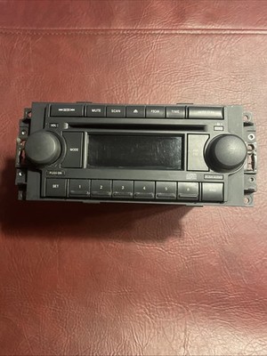 2006-2010 Chrysler Dodge Jeep AM FM Radio Receiver CD Player 05091710AE REF