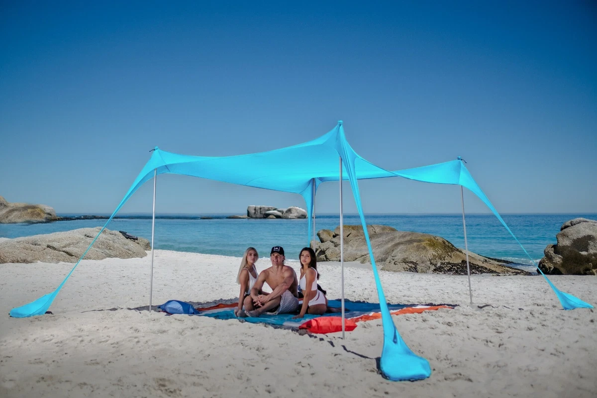 SUN NINJA 4 Person Pop Up Beach Tent Sun Shelter UPF50+ with Sand Shovel,  Ground Pegs, Stability Poles and Sand Free Beach Blanket (Turquoise)