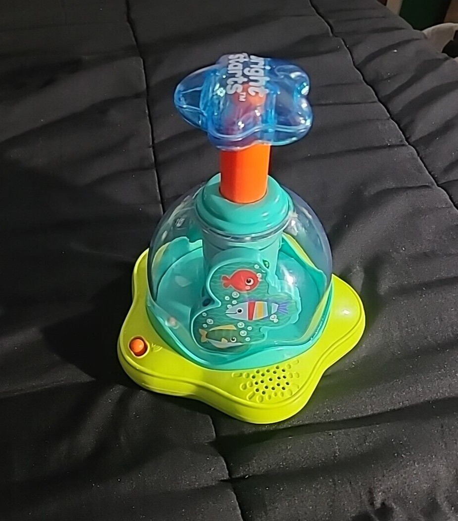 Bright Starts Press Glow Spinner Baby Toy Lights and Sound