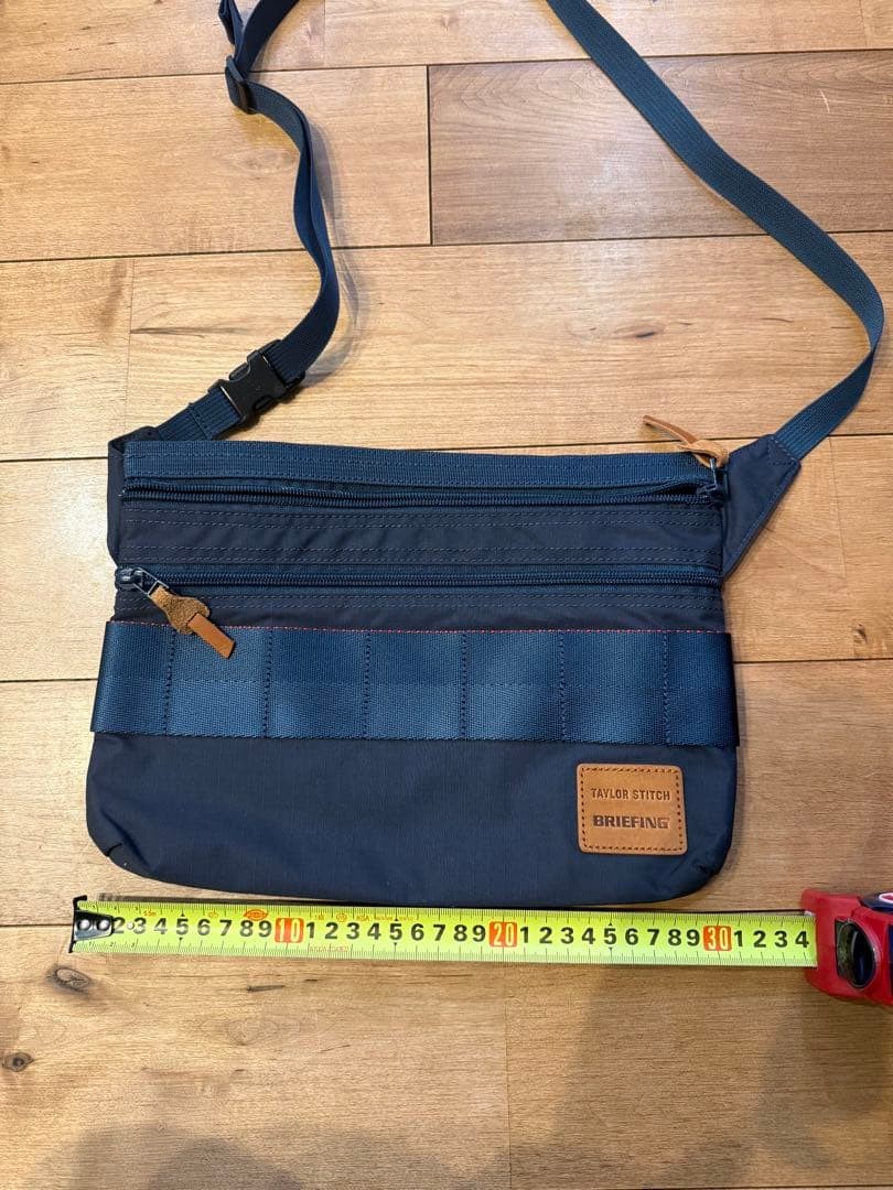 BRIEFING Navy Shoulder Bag Adjustable Strap Front Pocket