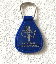 Vintage Keychain NCI Key Fob Ring ANTICIPATE THE UNEXPECTED Made in USA Plastic