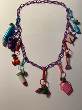 VINTAGE Retro 1980’S BELL CHARM Purple NECKLACE WITH 9 80’S PLASTIC CHARMS