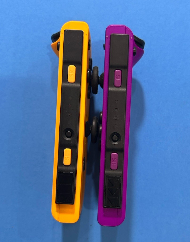 Nintendo Switch Joy-Con Controllers Purple Left & Orange Right OEM