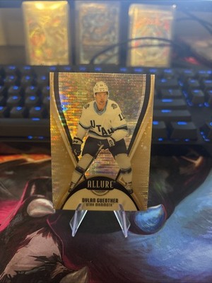 2025-26 Upper Deck Allure Gold Glitter Bomb Dylan Guenther /199