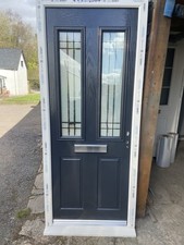 A 875-2060 NEW ANTHRACITE GREY TRADITIONAL FRONT DOOR IN WHITE UPVC FRAME