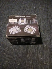 Deformable Led Garage/ Outdoor Light, Screws In Like A Light Bulb 60/ 100watt...