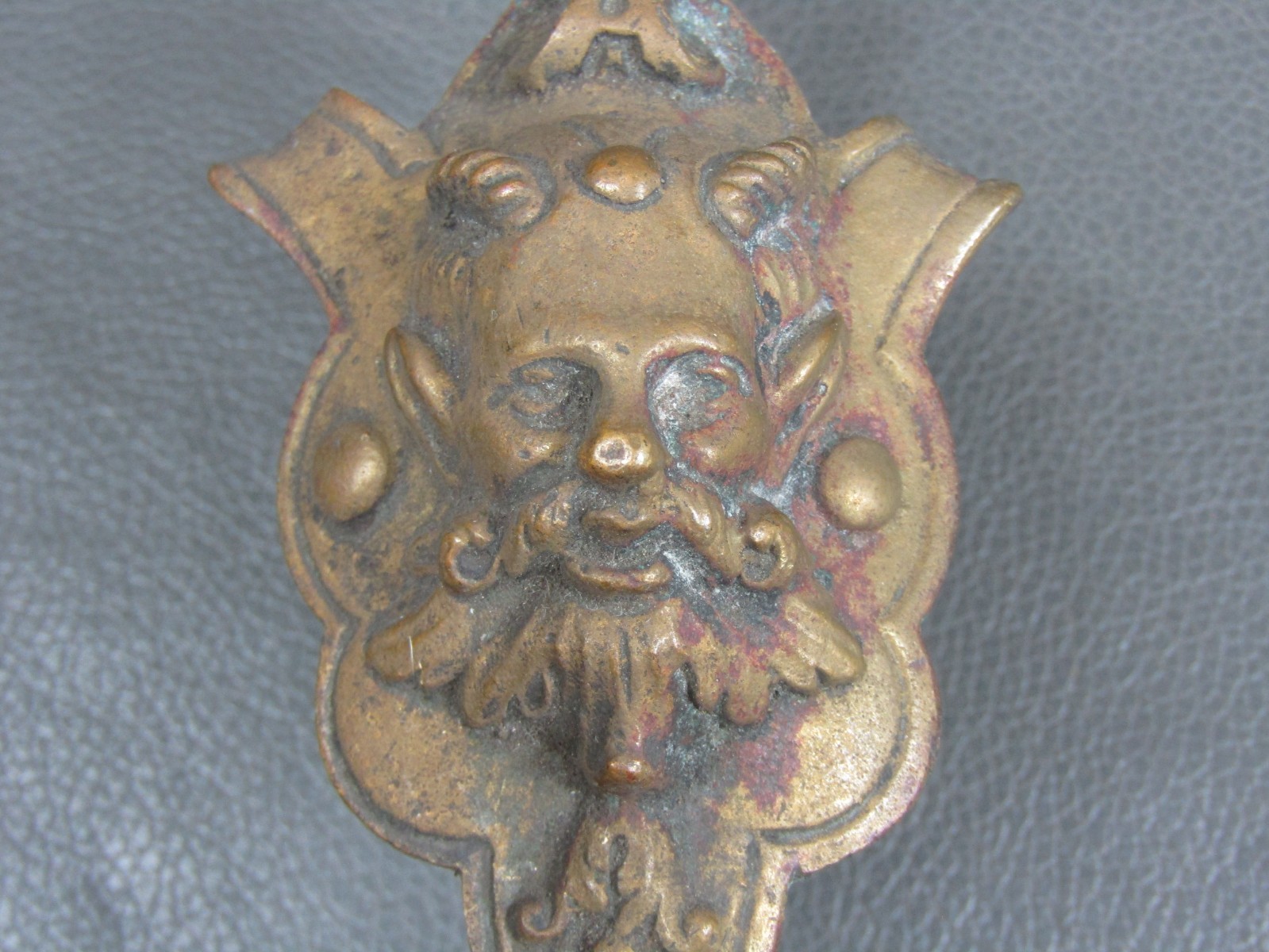 Antique cast brass or bronze devil horned man head furniture mount spare part