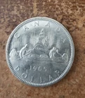 1965 uncirculated Canadian 80% silver dollar