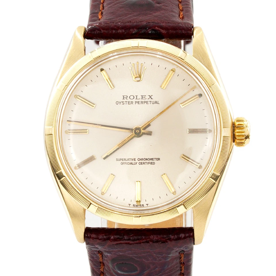 Reloj Rolex Oyster Perpetual 1003 de oro amarillo de 14 k para hombre esfera plateada papeles Rolex