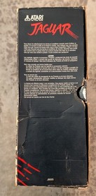 Boxed Atari Jaguar Console with 8 Games, spare controller and instructions.