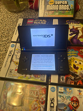 Nintendo DSi Wi-Fi Handheld Console with Nintendo DS Game Lot.Comes with 10 game