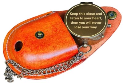 Keep this close and listen to your heart.Antique compass and Engraved Compass