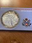1990 $1 American Silver Eagle Blue/Orange Rim Toned on Both Sides