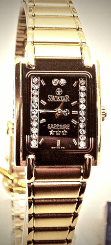 New Swistar 9582L Ladie's Precision Quartz Black Dial and Gold tone Watch