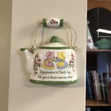 Lorrie Design Ceramic Tea Pot Hanging Wall Pocket Happiness Is Catching
