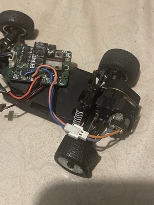 This is a Losi Micro-B 1/24 scale 2WD buggy, featuring  aluminum chassis
