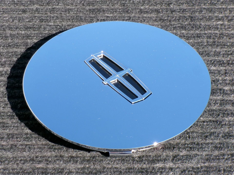 Una tapa central cromada Lincoln Continental genuina para 16" 22 ranuras 1995 1998 OEM Foto 2 de 4