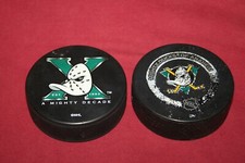 2 Vintage Used Official Anaheim Mighty Ducks Hockey Pucks 1 Official Game Puck