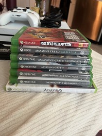 Microsoft Xbox One S + Assorted Games Lot of Seven