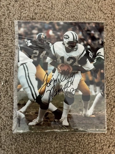 JOE NAMATH AUTOGRAPHED 8X10 PHOTO NEW YORK JETS (w/ COA, some damage on auto)